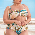 plus size model with floral light bikini top and draped bikini bottom
