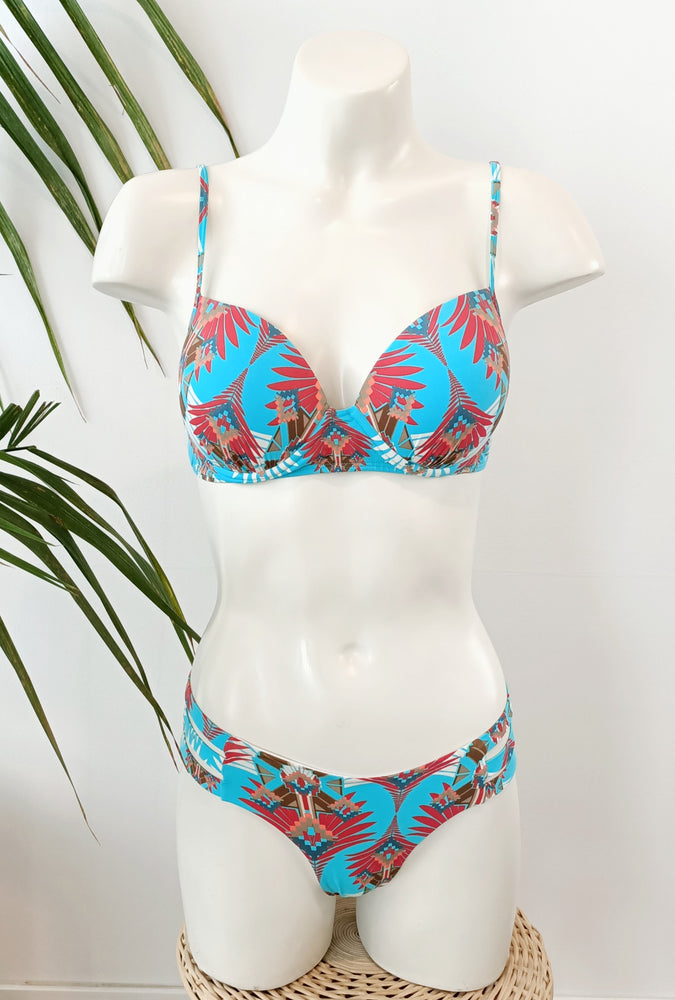 mannequin with blue booster bikini