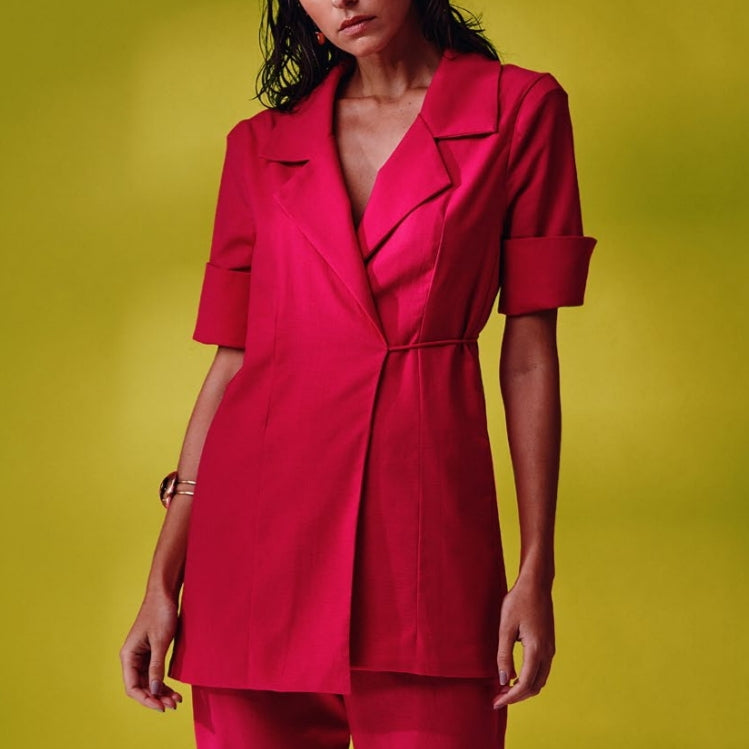 
                  
                    Model wears a pink short sleeved jacket
                  
                